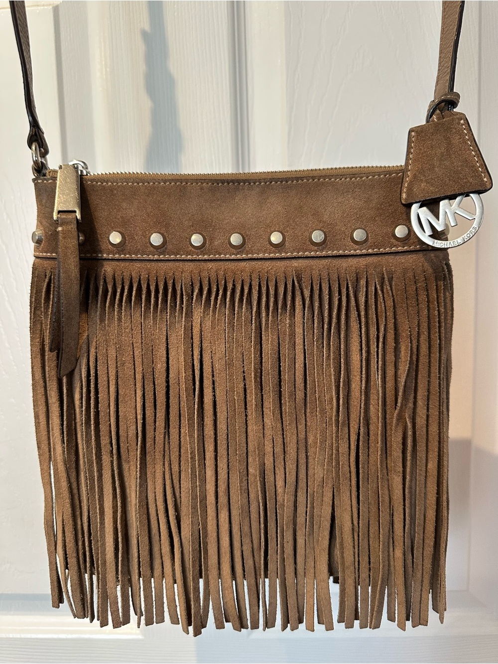 MICHAEL KORS Suede Brown Fringe Crossbody with Studs and MK Charm